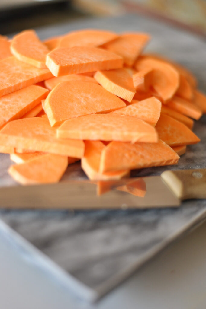 in process shot of chopping sweet potatoes 